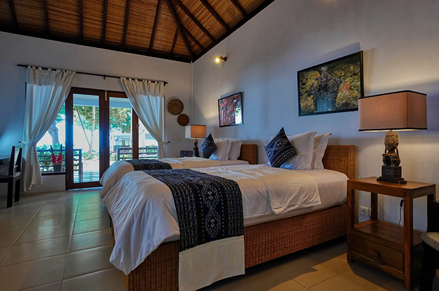 Bedroom - Seafront Villa - Spice Island Divers - Indonesia Dive Resort